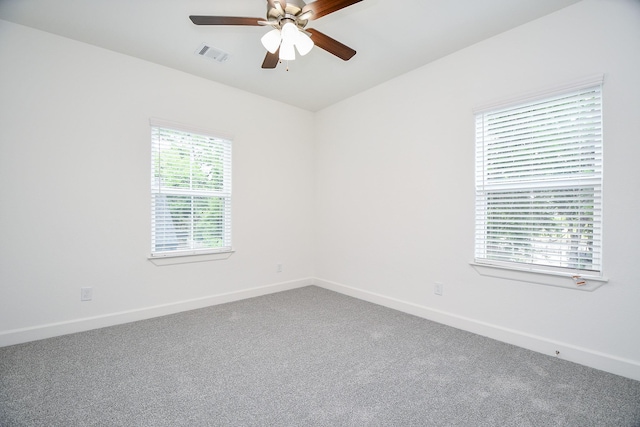 6727 Utah St, Houston, TX 77091 - empty room with ceiling fan, carpet flooring, and baseboards
