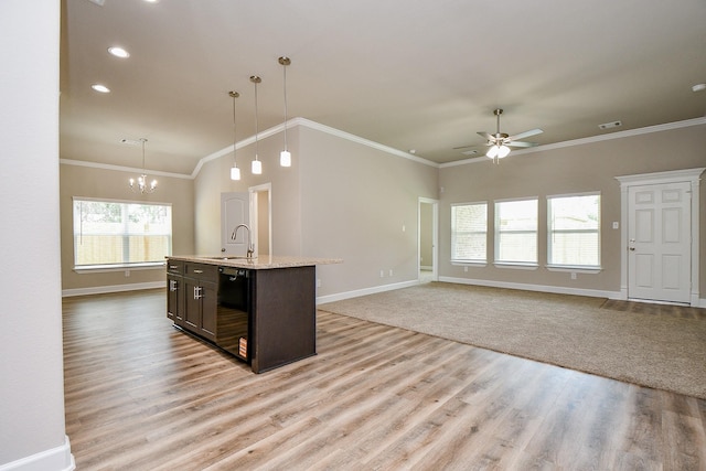 6519 Utah St, Houston, TX 77091 - kitchen featuring a sink, black dishwasher, open floor plan, ceiling fan, and ornamental molding