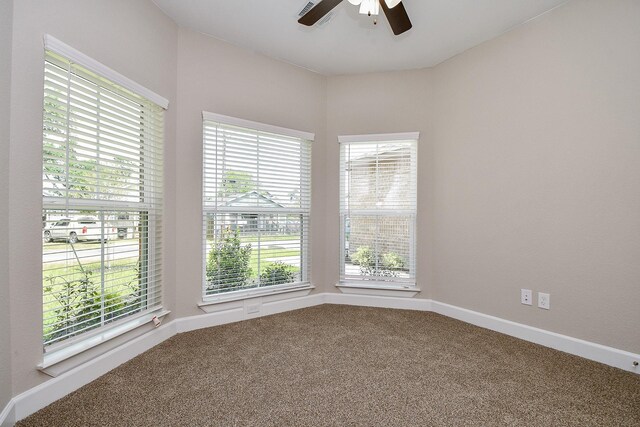 6519 Utah St, Houston, TX 77091 - carpeted spare room with ceiling fan and baseboards