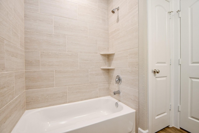 6519 Utah St, Houston, TX 77091 - bathroom with  shower combination and wood finished floors
