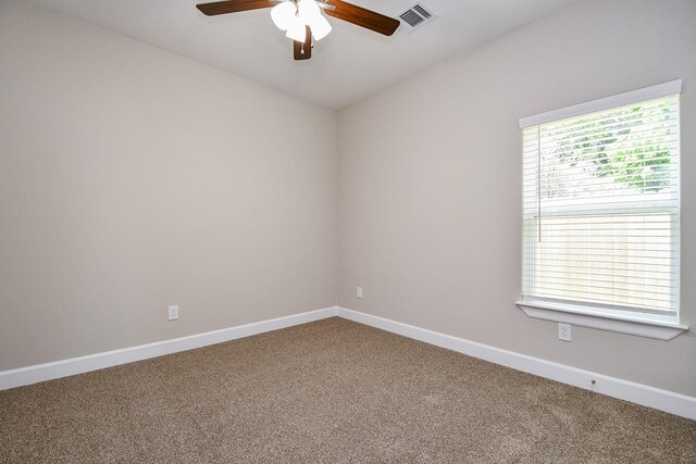 6519 Utah St, Houston, TX 77091 - spare room featuring carpet, a ceiling fan, and baseboards