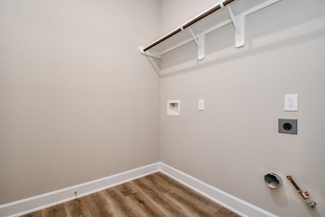 6519 Utah St, Houston, TX 77091 - laundry area featuring gas dryer hookup, hookup for a washing machine, hookup for an electric dryer, dark wood-style flooring, and baseboards