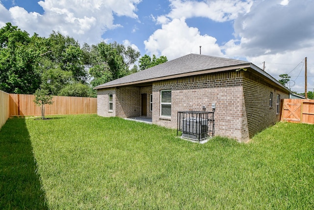 6519 Utah St, Houston, TX 77091 - rear view of house with brick siding and roof with shingles