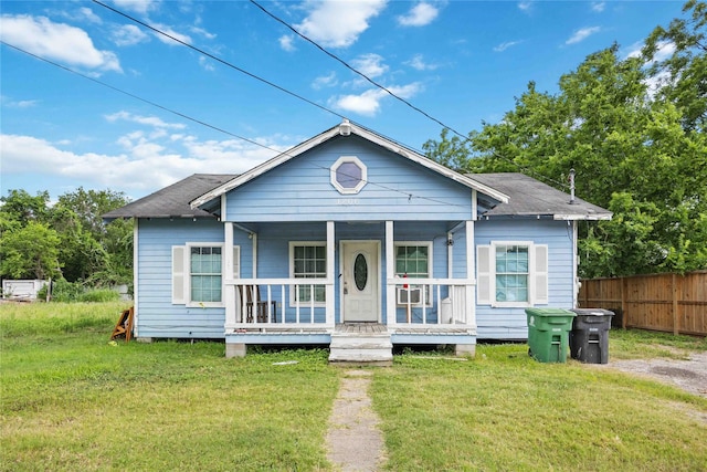 1206 Dewalt St, Houston, TX 77088 - view of front of property with a porch and roof with shingles