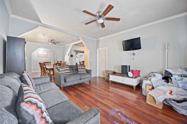 1206 Dewalt St, Houston, TX 77088 - living area featuring a ceiling fan, wood finished floors, and crown molding