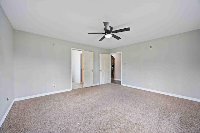 1206 Dewalt St, Houston, TX 77088 - unfurnished bedroom featuring carpet, baseboards, and ceiling fan