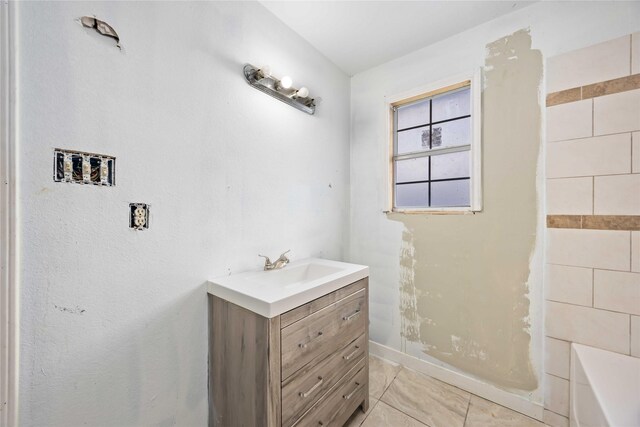 1206 Dewalt St, Houston, TX 77088 - bathroom with vanity, tile patterned flooring, and bathtub / shower combination