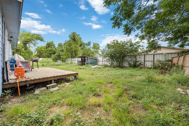 1206 Dewalt St, Houston, TX 77088 - fenced backyard with a deck