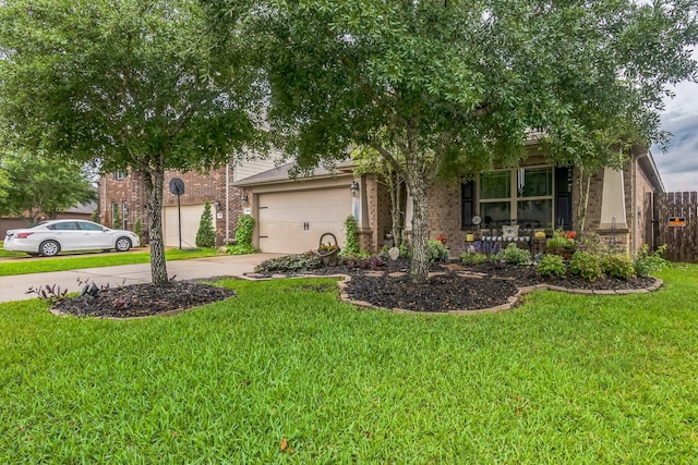17915 Tall Chestnut St, Cypress, TX 77429 - obstructed view of property featuring brick siding, driveway, an attached garage, and covered porch