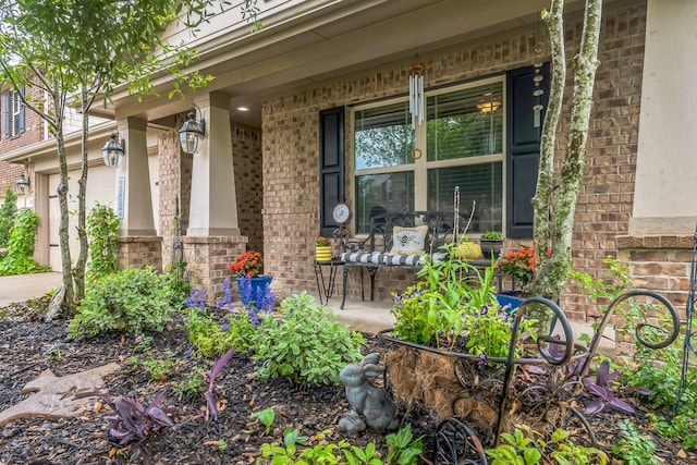 17915 Tall Chestnut St, Cypress, TX 77429 - entrance to property with brick siding, a porch, an attached garage, and driveway