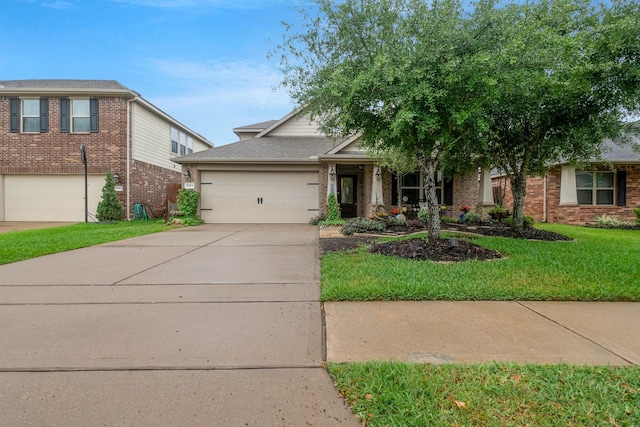 17915 Tall Chestnut St, Cypress, TX 77429 - view of front of house featuring concrete driveway, brick siding, and a front yard
