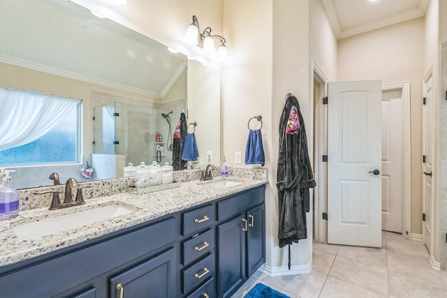 17915 Tall Chestnut St, Cypress, TX 77429 - full bath featuring ornamental molding, double vanity, a shower stall, tile patterned flooring, and baseboards
