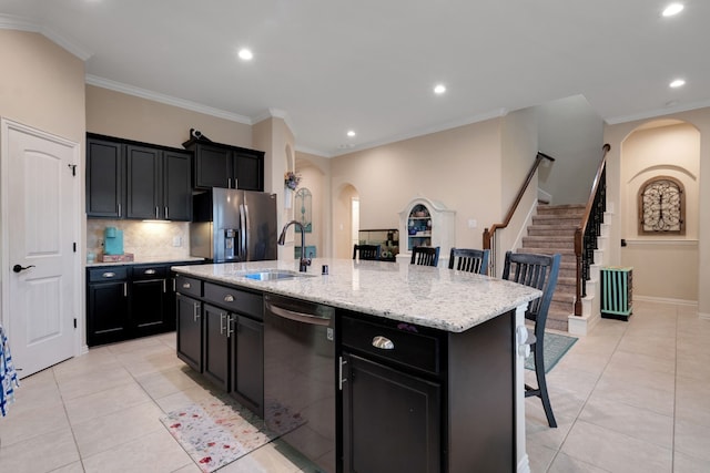 17915 Tall Chestnut St, Cypress, TX 77429 - kitchen featuring dishwasher, arched walkways, dark cabinetry, stainless steel refrigerator with ice dispenser, and crown molding