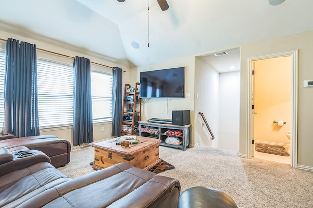 17915 Tall Chestnut St, Cypress, TX 77429 - carpeted living area featuring vaulted ceiling, a ceiling fan, and baseboards