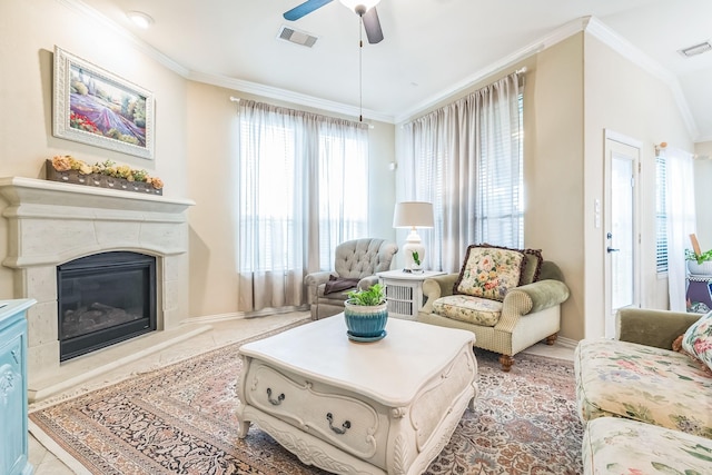 17915 Tall Chestnut St, Cypress, TX 77429 - living area with ornamental molding, a ceiling fan, a premium fireplace, and baseboards