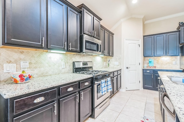 17915 Tall Chestnut St, Cypress, TX 77429 - kitchen featuring stainless steel appliances, light tile patterned flooring, light stone countertops, ornamental molding, and decorative backsplash