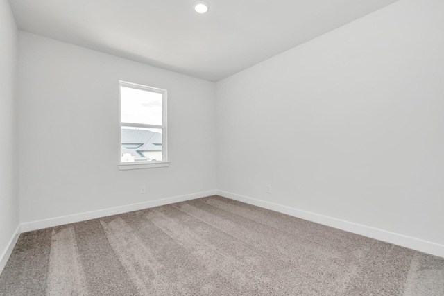 21118 Chelton Beach Dr, Cypress, TX 77433 - unfurnished room with carpet floors, baseboards, and recessed lighting