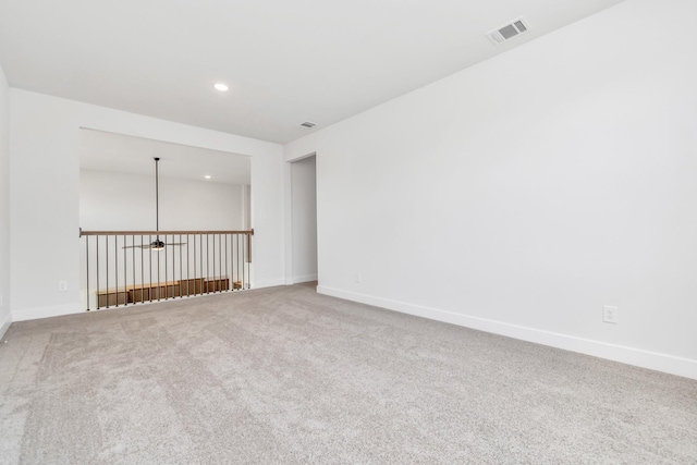 21118 Chelton Beach Dr, Cypress, TX 77433 - carpeted empty room with baseboards and recessed lighting