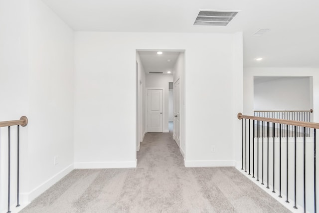 21118 Chelton Beach Dr, Cypress, TX 77433 - hallway with carpet flooring, baseboards, recessed lighting, and an upstairs landing