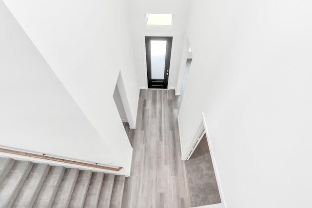 21118 Chelton Beach Dr, Cypress, TX 77433 - stairway with wood finished floors and a high ceiling