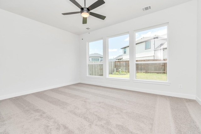 21118 Chelton Beach Dr, Cypress, TX 77433 - carpeted empty room featuring baseboards and ceiling fan