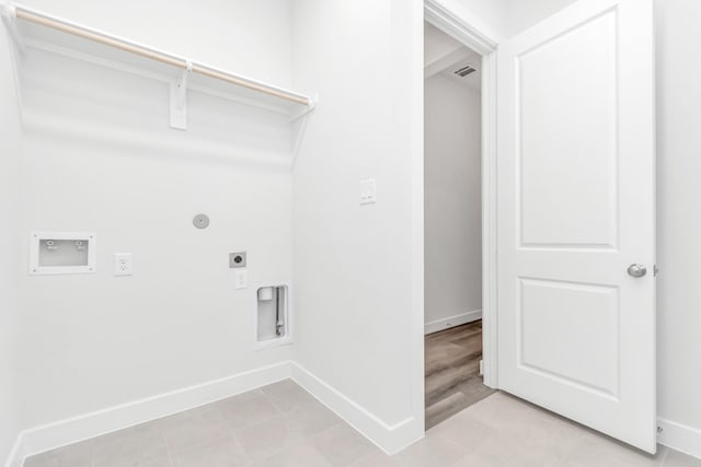 21118 Chelton Beach Dr, Cypress, TX 77433 - washroom featuring electric dryer hookup, baseboards, hookup for a washing machine, and gas dryer hookup