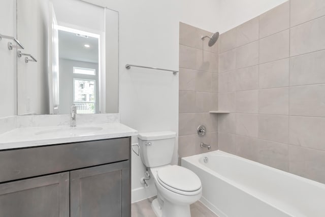 21118 Chelton Beach Dr, Cypress, TX 77433 - bathroom with vanity, toilet, and tub / shower combination