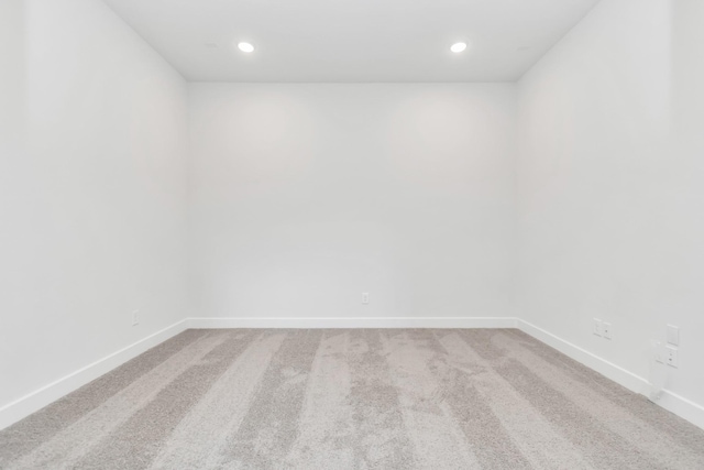 21118 Chelton Beach Dr, Cypress, TX 77433 - carpeted empty room with baseboards and recessed lighting