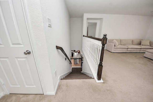 16350 Oakside Hollow Ln, Houston, TX 77084 - stairway featuring carpet floors and baseboards