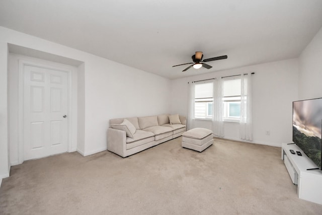 16350 Oakside Hollow Ln, Houston, TX 77084 - living room featuring ceiling fan, light carpet, and baseboards