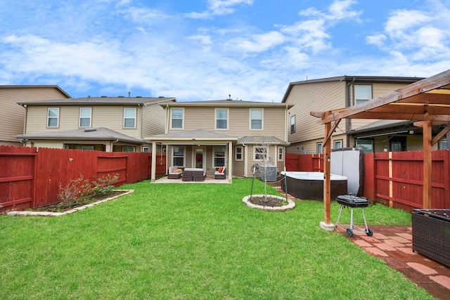 16350 Oakside Hollow Ln, Houston, TX 77084 - back of property with a patio and an outdoor hangout area