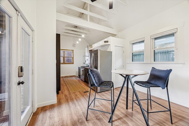 542 Arlington St, Houston, TX 77007 - dining space with light wood-type flooring, baseboards, and a ceiling fan