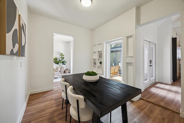 542 Arlington St, Houston, TX 77007 - dining room with wood finished floors and baseboards