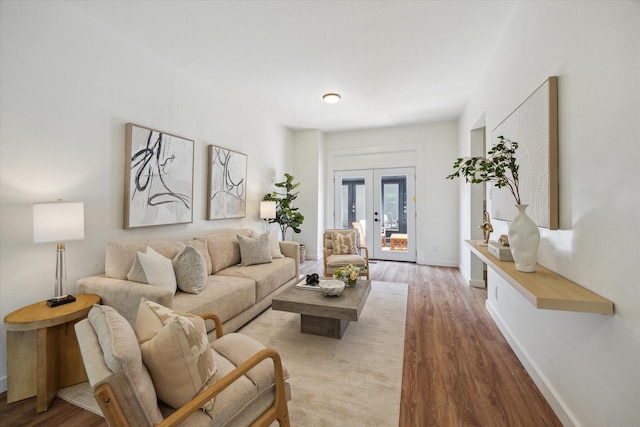 542 Arlington St, Houston, TX 77007 - living room featuring wood finished floors, baseboards, and french doors