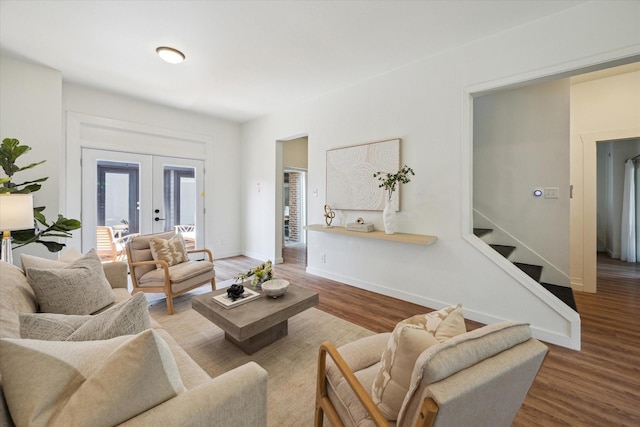 542 Arlington St, Houston, TX 77007 - living area featuring french doors, wood finished floors, stairs, and baseboards