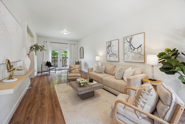 542 Arlington St, Houston, TX 77007 - living area featuring dark wood-style floors, french doors, and baseboards