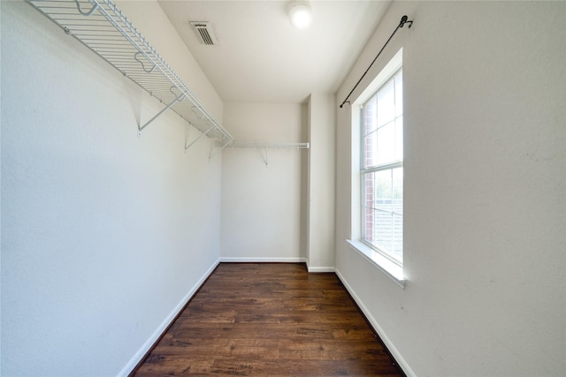 6610 Autumn Sunset Ln, Spring, TX 77379 - spacious closet featuring wood finished floors