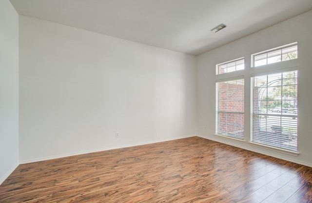 12223 Ayrshire Pl, Houston, TX 77089 - spare room featuring wood finished floors and baseboards
