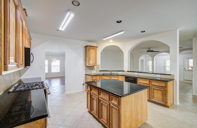 12223 Ayrshire Pl, Houston, TX 77089 - kitchen with a sink, dishwasher, light tile patterned flooring, backsplash, and stainless steel microwave