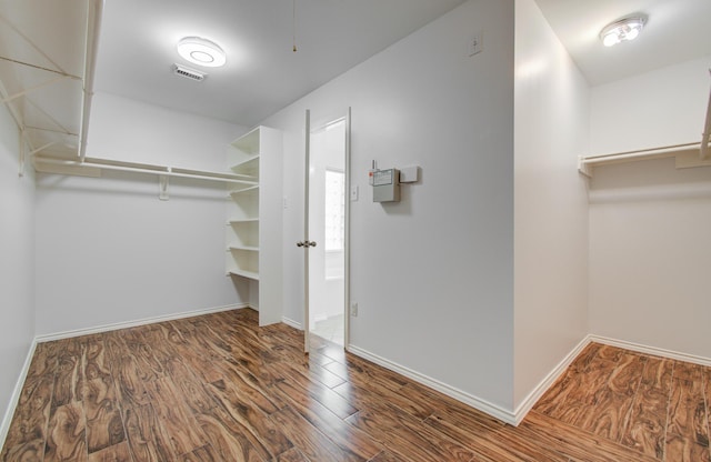 12223 Ayrshire Pl, Houston, TX 77089 - walk in closet featuring wood finished floors
