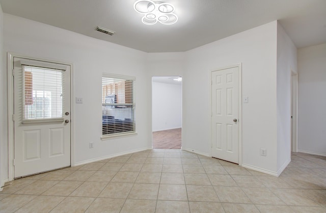 12223 Ayrshire Pl, Houston, TX 77089 - foyer with baseboards and light tile patterned flooring
