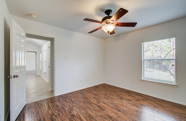 12223 Ayrshire Pl, Houston, TX 77089 - spare room featuring a ceiling fan, wood finished floors, and baseboards