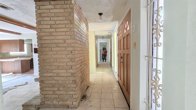 3823 Regency Dr, Houston, TX 77045 - hall with light tile patterned flooring