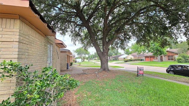 3823 Regency Dr, Houston, TX 77045 - view of green lawn with a residential view