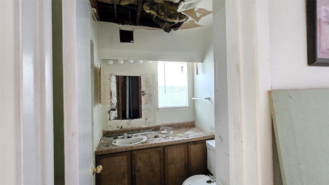 3823 Regency Dr, Houston, TX 77045 - half bathroom with vanity and toilet