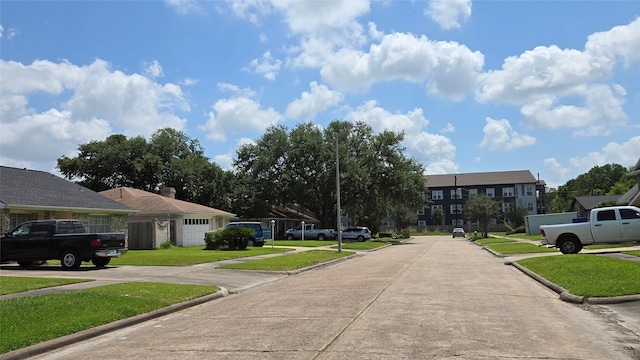 3823 Regency Dr, Houston, TX 77045 - view of concrete street with curbs and a residential view