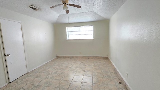 3823 Regency Dr, Houston, TX 77045 - spare room with a textured ceiling, a ceiling fan, and baseboards