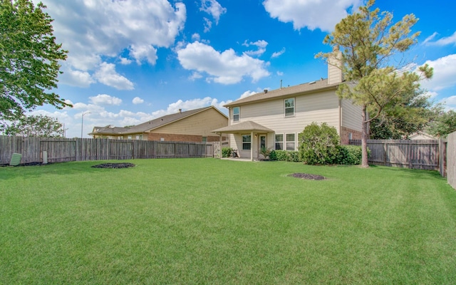 17919 Royal Gate Ln, Richmond, TX 77407 - back of property featuring a chimney