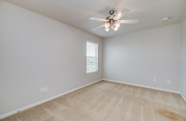 17919 Royal Gate Ln, Richmond, TX 77407 - unfurnished room featuring light colored carpet, ceiling fan, and baseboards