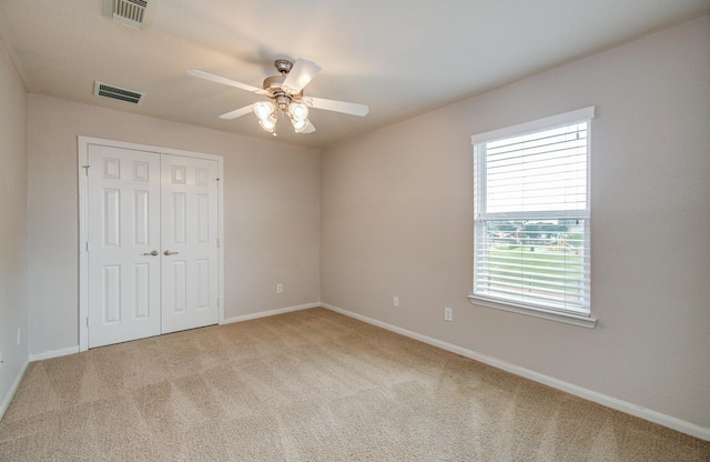 17919 Royal Gate Ln, Richmond, TX 77407 - unfurnished bedroom featuring carpet floors, a closet, and baseboards